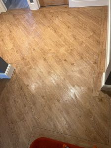 OLD ENGLISH OAK LVT FLOORING with BORDER by Brampton Chase