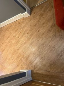 OLD ENGLISH OAK LVT FLOORING with BORDER by Brampton Chase